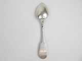 a spoon that is sitting on a table
