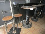 three stools and a table in a room
