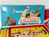 a box that has a game in it and a box with a picture of a man on it
