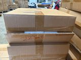 boxes stacked on top of each other in a warehouse