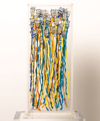 a picture of a display of colorful ribbons on a shelf