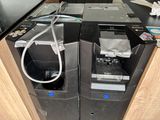 two machines that are sitting on a counter