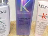 a bottle of kerastase and a tube of kerastase next to each other
