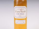 a bottle of liquid that is sitting on a table