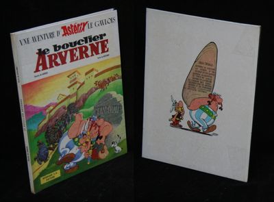 two books that are sitting on a table
