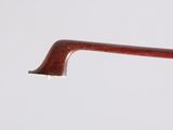 a close up of a wooden handle on a pole