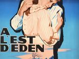 une vieille affiche de cinéma représentant un homme tenant une femme dans ses bras