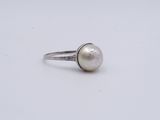 sterling silver ring with a white pearl