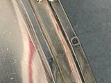 a close up of a silver plate on a table