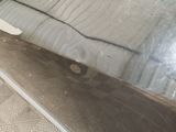 a close up of a bed with a mattress on top of it