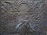 an image of a stone relief of a man and a woman