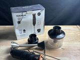 a box with a blender and a blender on a table