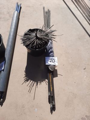 a lot of tools that are laying out on the ground