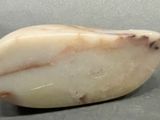 a white stone that is sitting on a table