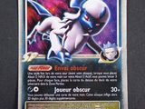 a close up of a pokemon card on a table
