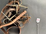 an old pair of shoes and a pair of scissors on a table