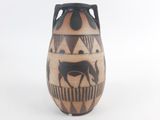 a vase that has a picture of a horse on it