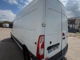 a white van that is parked in the parking lot
