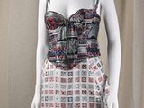 a mannequin wearing a dress with a pattern on it