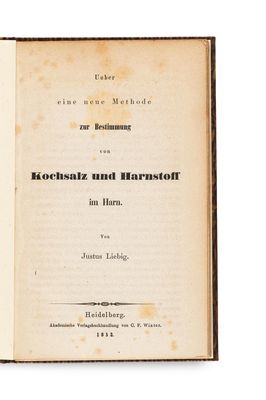 an old book with a black and white title on it
