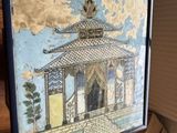 la photo d'une photo d'un bâtiment posé sur une table