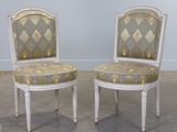pair of louis xvi style painted chairs with upholstered upholstered seats
