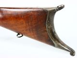 a close up of a rifle on a white background with a white background