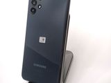 a close up of a cell phone on a stand