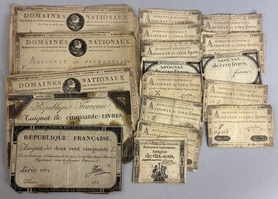 an assortment of old french currency and other papers on a table