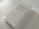 a white box sitting on top of a white table