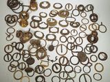 many different types of metal rings on the table