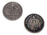 two silver coins with a crown on the front and a crown on the back
