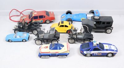 a lot of toy cars that are sitting on a table
