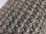 a close up of a piece of carpet on a table