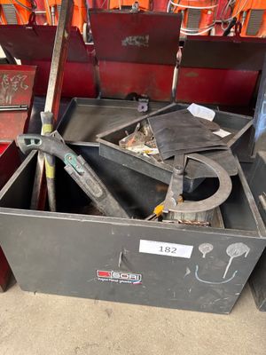 a metal tool box with tools inside of it