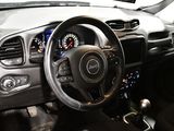 a dashboard of a car with a steering wheel and dashboard lights