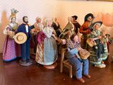 many figurines that are sitting on a table