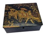 an image of a black and gold box with a horse drawn carriage on it