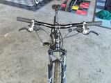 a bicycle that is parked in a garage