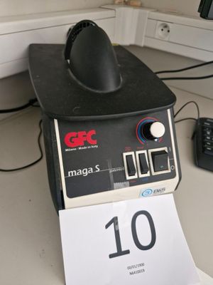 a clock that is on top of a desk