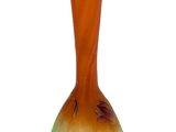a glass vase with a bird design on it