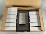 a box with a bunch of white and black electronic devices inside of it