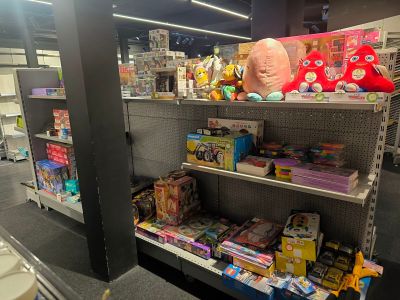a display of toys and toys on the shelves in a store