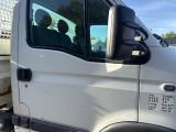 a white truck that is parked on the side of the road