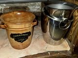 pots and pans are sitting on a shelf in a kitchen