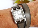a close up of a person ' s wrist with a watch on it