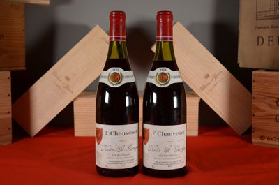 two bottles of wine sitting next to each other on a table