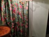 a lamp that is sitting on a table in a room