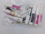 a close up of three tubes of lipstick in a plastic bag