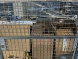 a cart with boxes on top of it in a warehouse